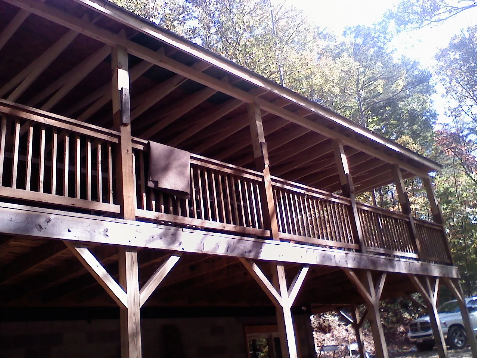 Timber framing under a new elevated porch and deck — Roof Leak Repair in Camas by Roofing Brothers